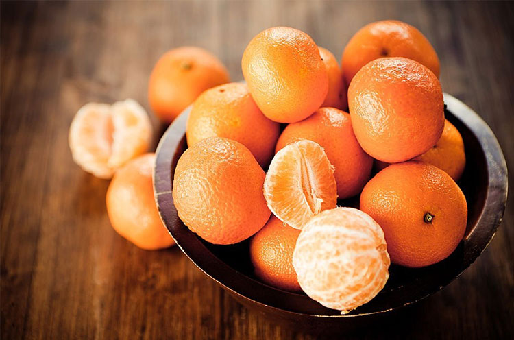 Oranges kept in a bowl - Emoha