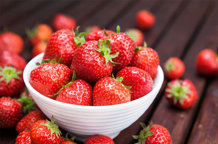 Strawberries kept in a bowl - Emoha